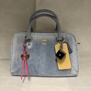 Coach loved denim Rowan with charms medium size